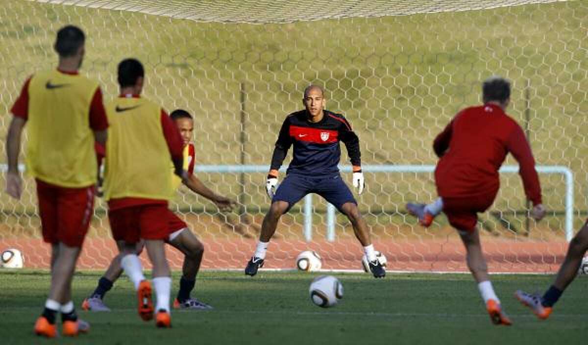U.S. goalkeeper Tim Howard protects the net during training.