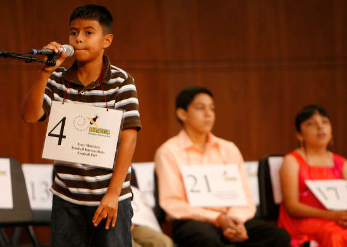 Tony Martinez, of Tomball Intermediate School, puts his spelling to the test at the Maseca Bilingual Spelling Bee at Houston Baptist University. Students from around Texas and Mexico competed.