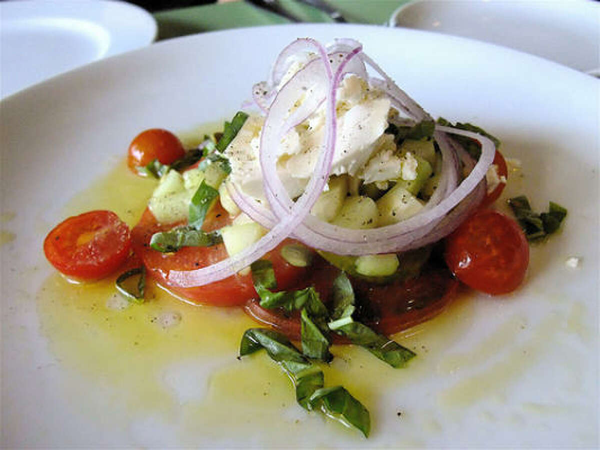 Heirloom tomato salad with feta, cucumber, red onion, mint & basil at Canopy