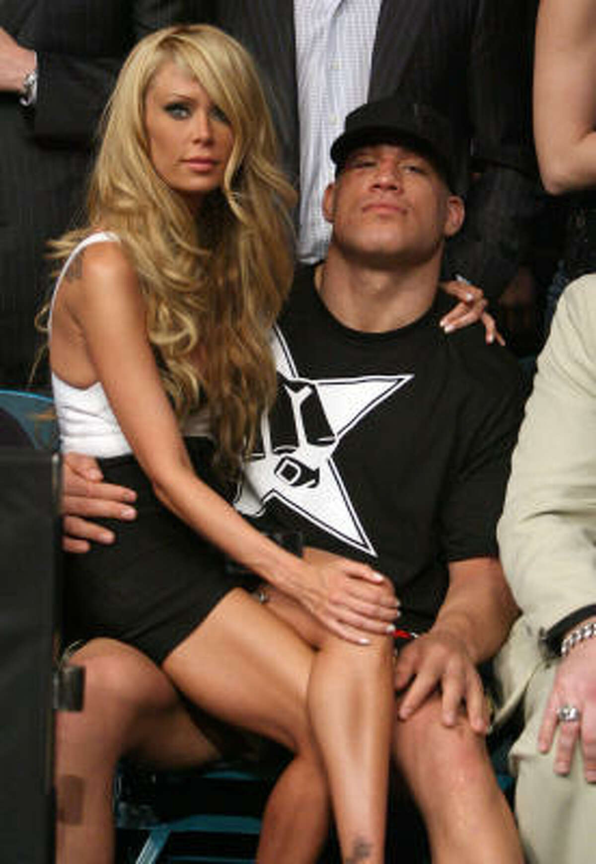 FILE - In this May 24, 2008 file photo, mixed martial arts star Tito Ortiz, right, is seen with Jenna Jameson after his fight at UFC 84 at the MGM Grand Garden Arena in Las Vegas. Ortiz was arrested on suspicion of domestic violence Monday, April 26, 2010, at the home he shares with Jameson.