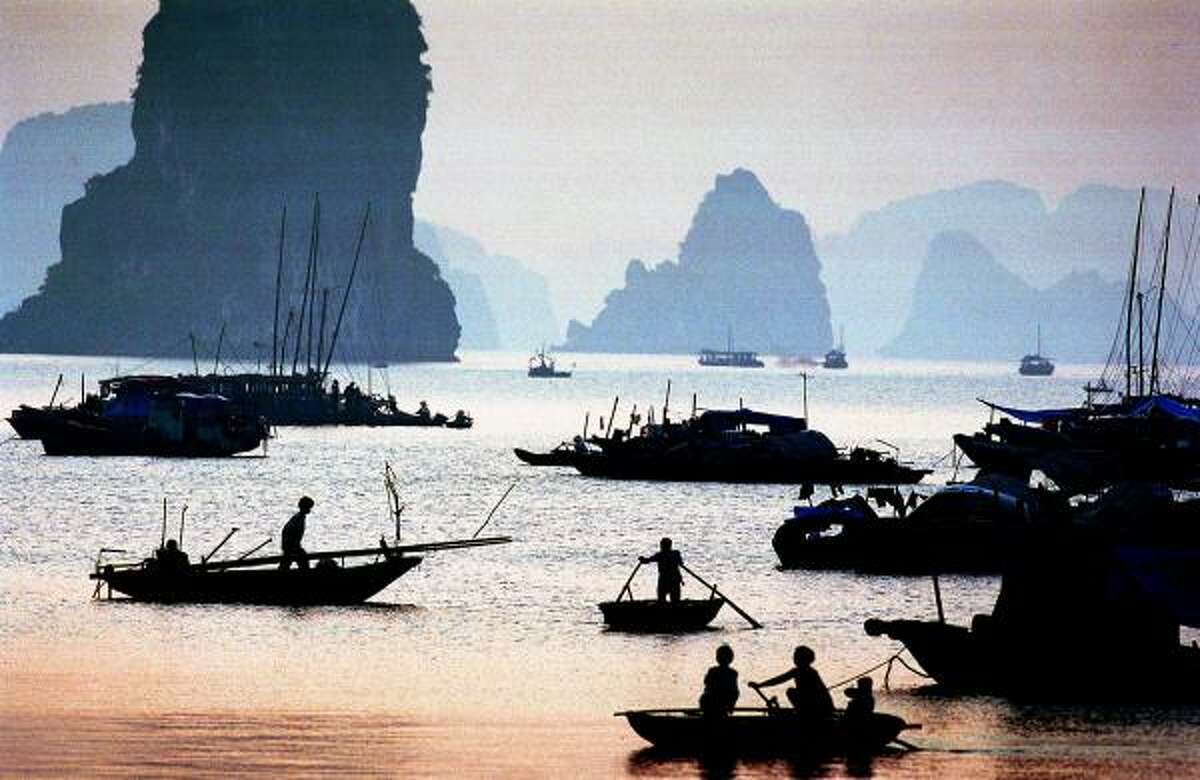 Halong Bay in Vietnam is known for the limestone monolithic islands located in the bay. Many of the nearly 2,000 islands are hollow, with enormous caves and grottos.