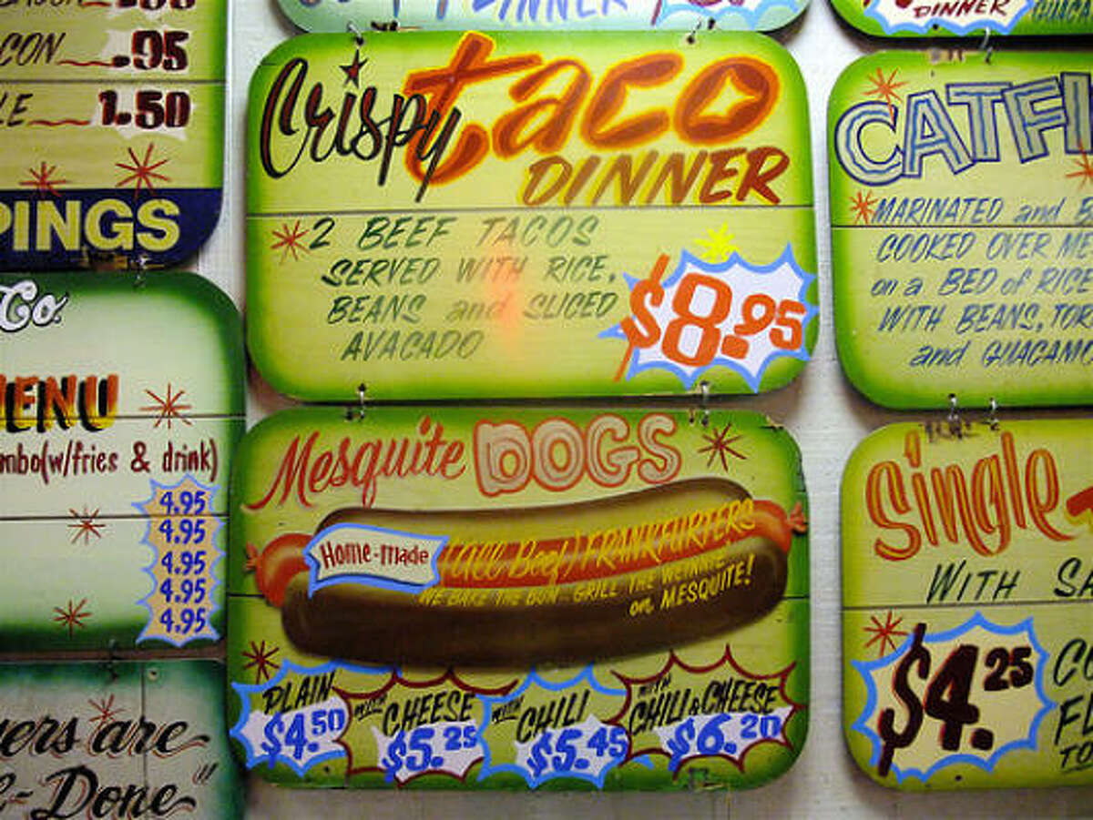 The prices have changed over the decades, but the handpainted signage at Goode Co. Taqueria remains the same.
