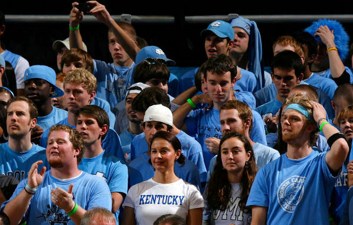 Actress Ashley Judd cheers for the Kentucky Wildcats from the North Carolina Tar Heels' student section.
