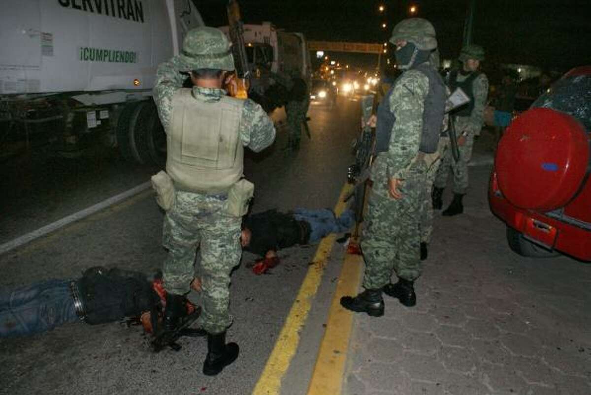 mexico bodies hanging from overpass