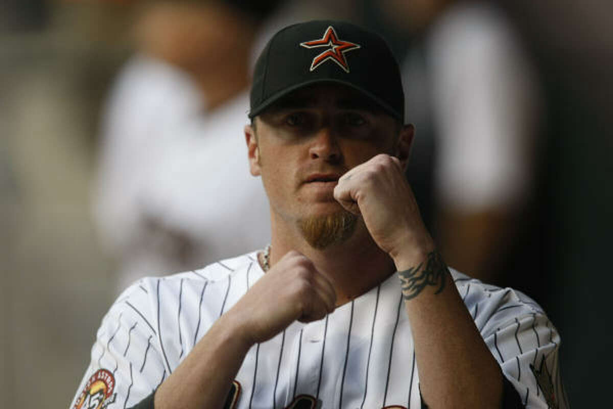 Astros pitcher Brett Myers pumps his fist as he mimics the pulling of a train's horn as the Astros train howls at the start of the game.