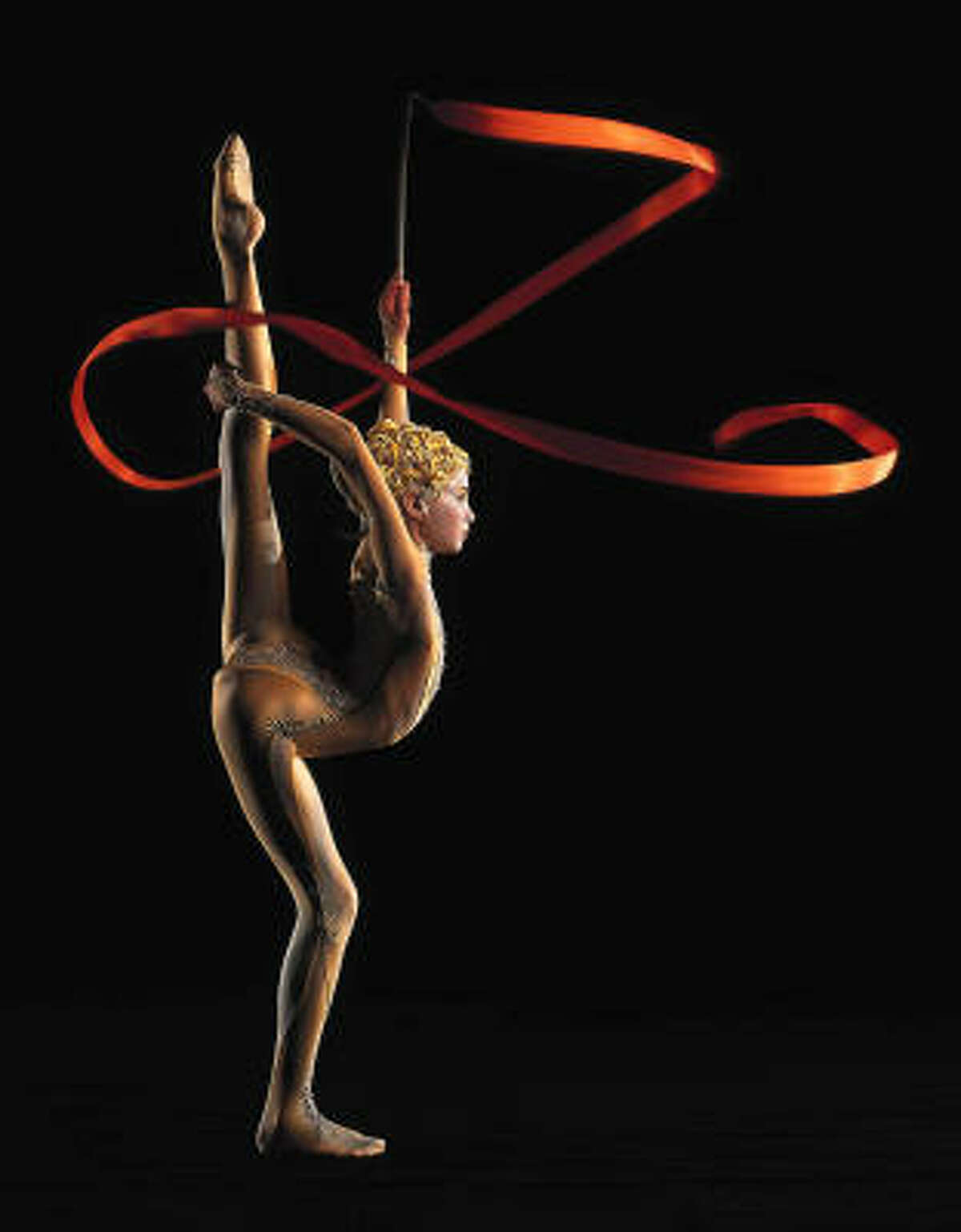 One part of "Alegria" combines rhythmic gymnastics, flexible contortion, deft juggling and graceful ballet into a single act.