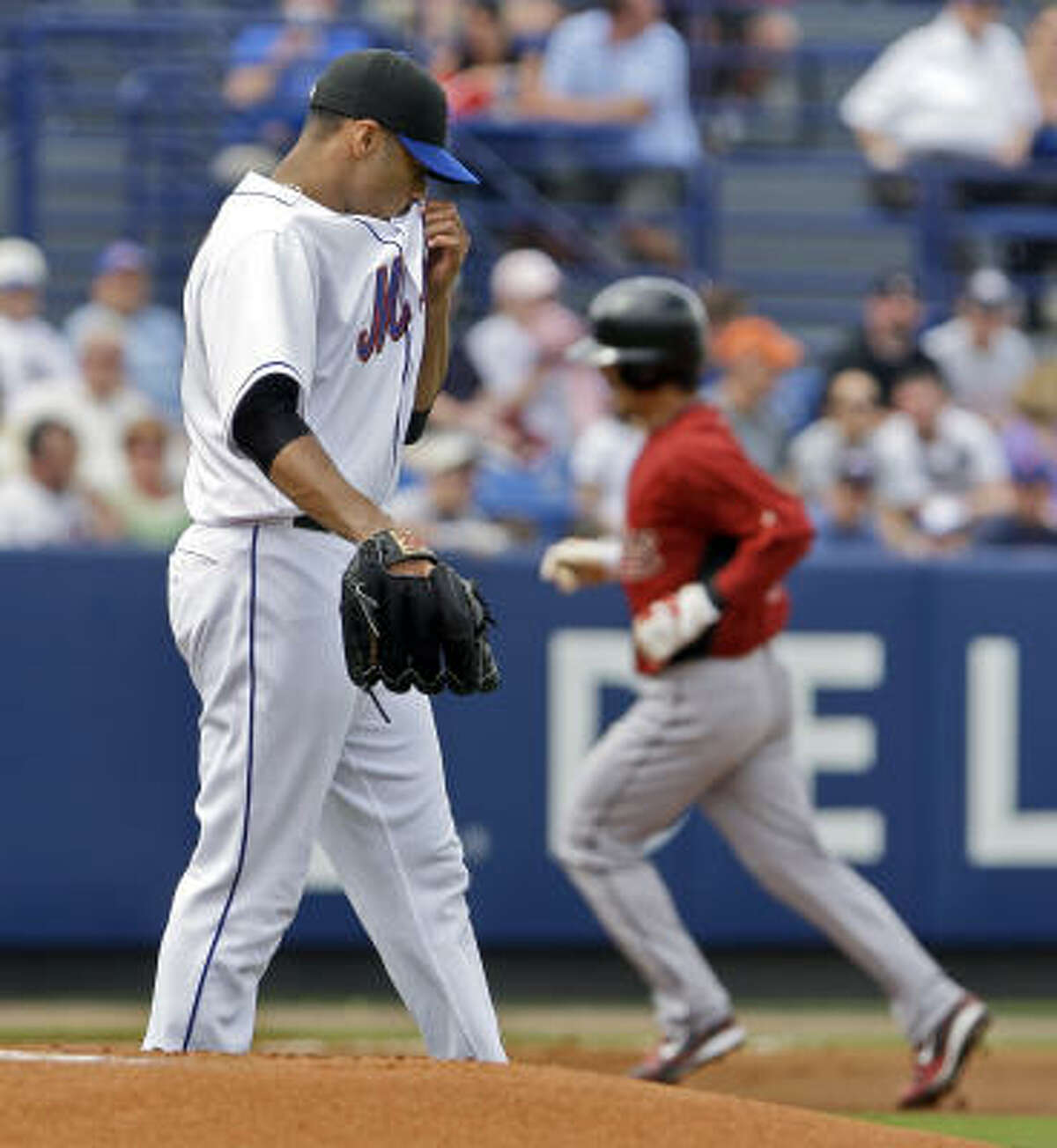 Kaz Matsui rounds the bases after hitting a solo home run off Johan Santana in the first inning. Matsui went 2 for 2.