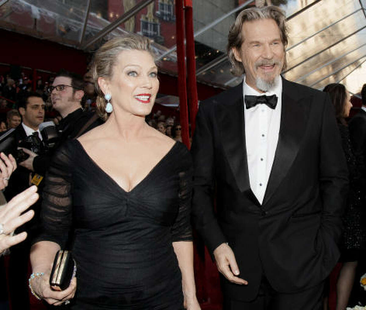 Jeff Bridges, usually hands-down handsome, looks vaguely Colonel Sanders with his Confederate beard. Nice Gucci tux, though.