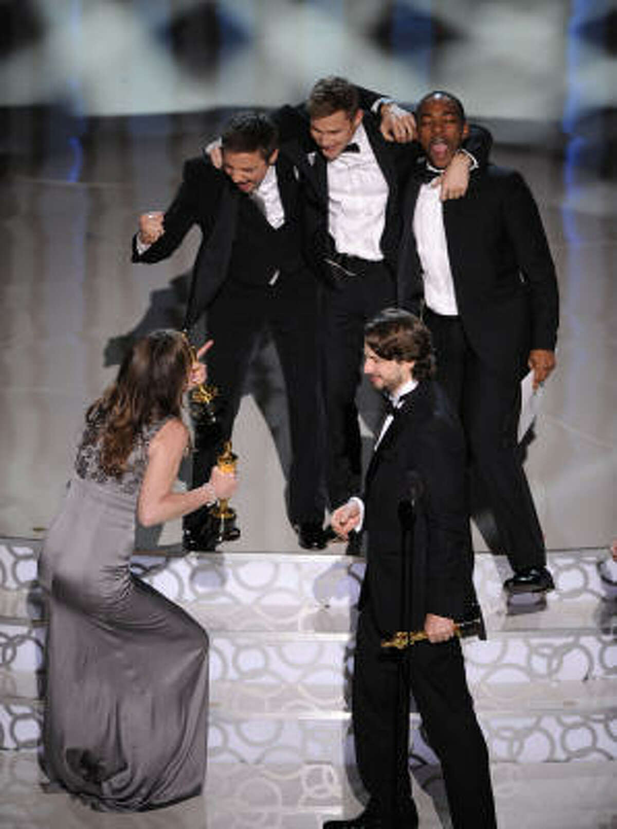 Double fisted: What was the most moving image of the night? Seeing “The Hurt Locker” director Kathryn Bigelow with an Oscar in each hand. The rest of the team looked pretty excited too.