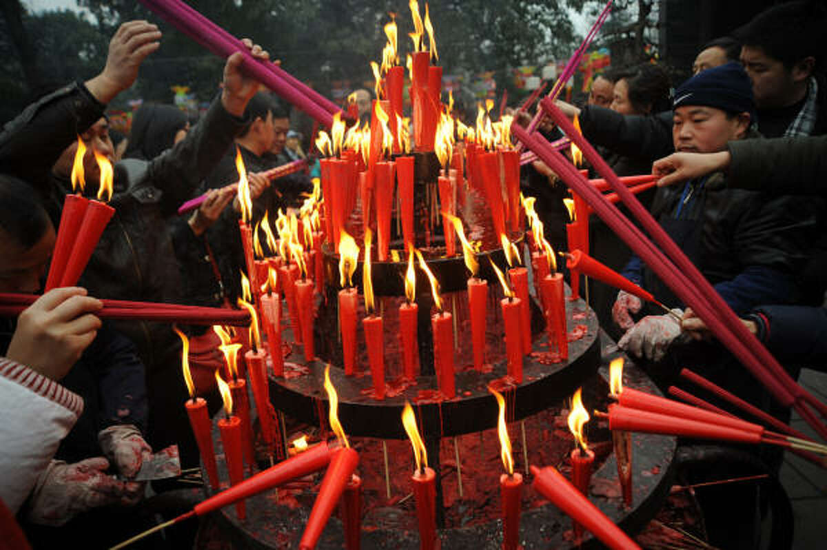 Candles Along with incense, candles are lit while praying for good luck.