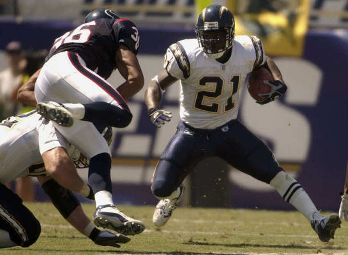 LaDainian Tomlinson ran for 1,683 yards in 2002, including 84 yards against the Houston Texans in a 24-3 win for the San Diego Chargers.