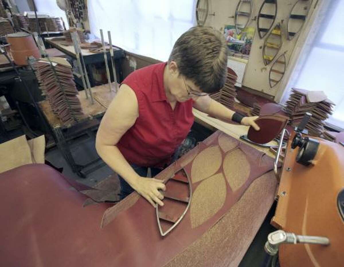 Ohio factory hand making all Super Bowl game balls