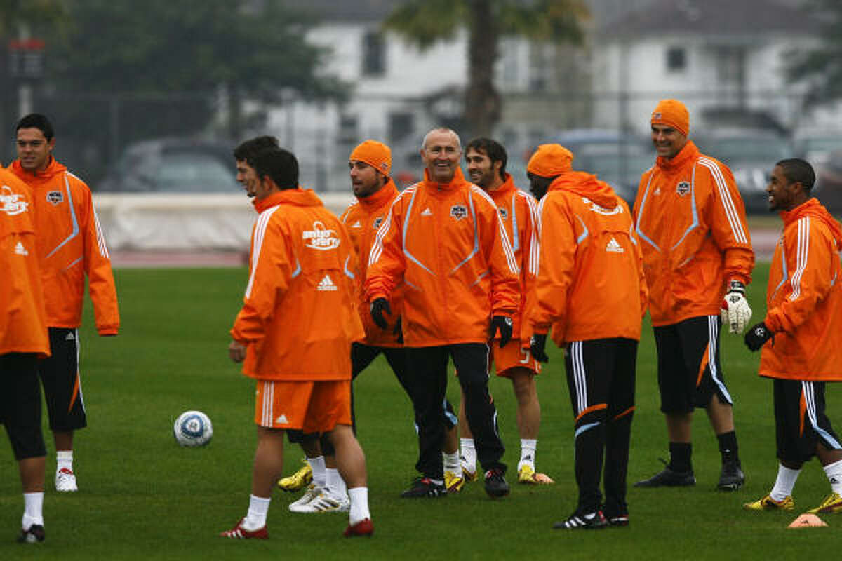 Dynamo coach Dominic Kinnear, center, prepares his team for the start of their first practice. Training is expected to run from 10-11:15 a.m. each day this week, with a scrimmage against Houston Baptist on Saturday. Led by coach Dominic Kinnear, whose career winning percentage of .598 (79-43-62) in MLS regular season games is the best in league history, the Dynamo are entering their fifth season in Houston. The Dynamo won back-to-back MLS Cup titles in 2006 and 2007 and have finished first or tied for first in the Western Conference in each of the last two seasons.