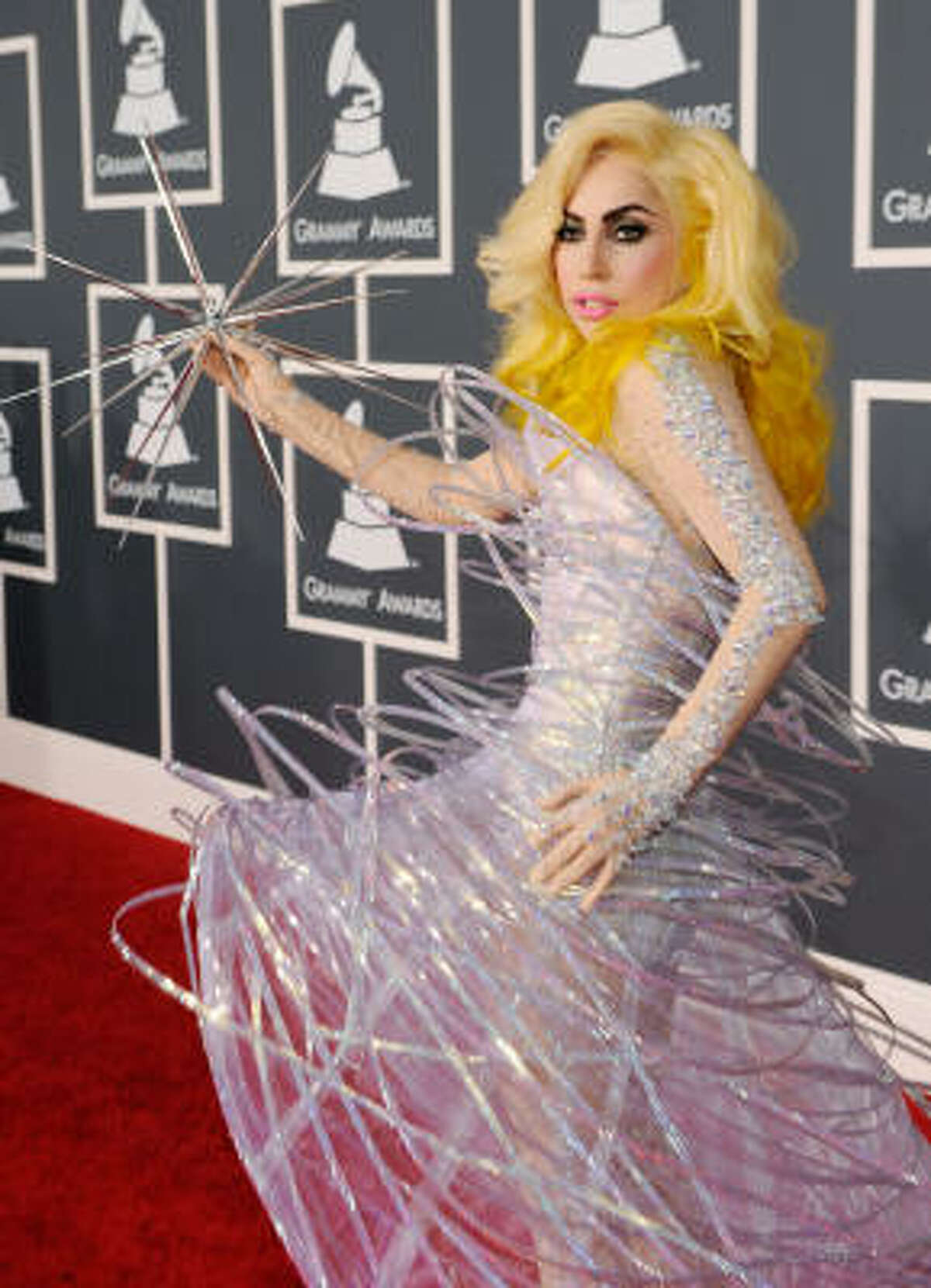 Lady Gaga, in celestial attire, made her strangely intriguing entrance. She even brought her own star.