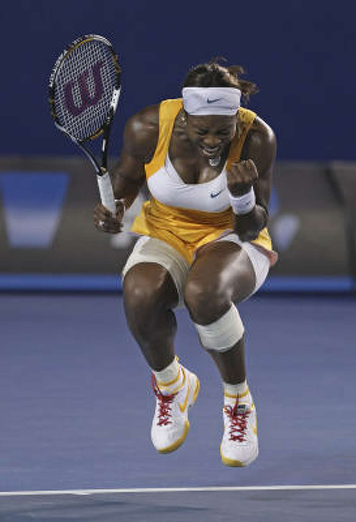 Serena Williams reacts after winning her second straight Australian Open championship 6-4, 3-6, 6-2 over Justine Henin.