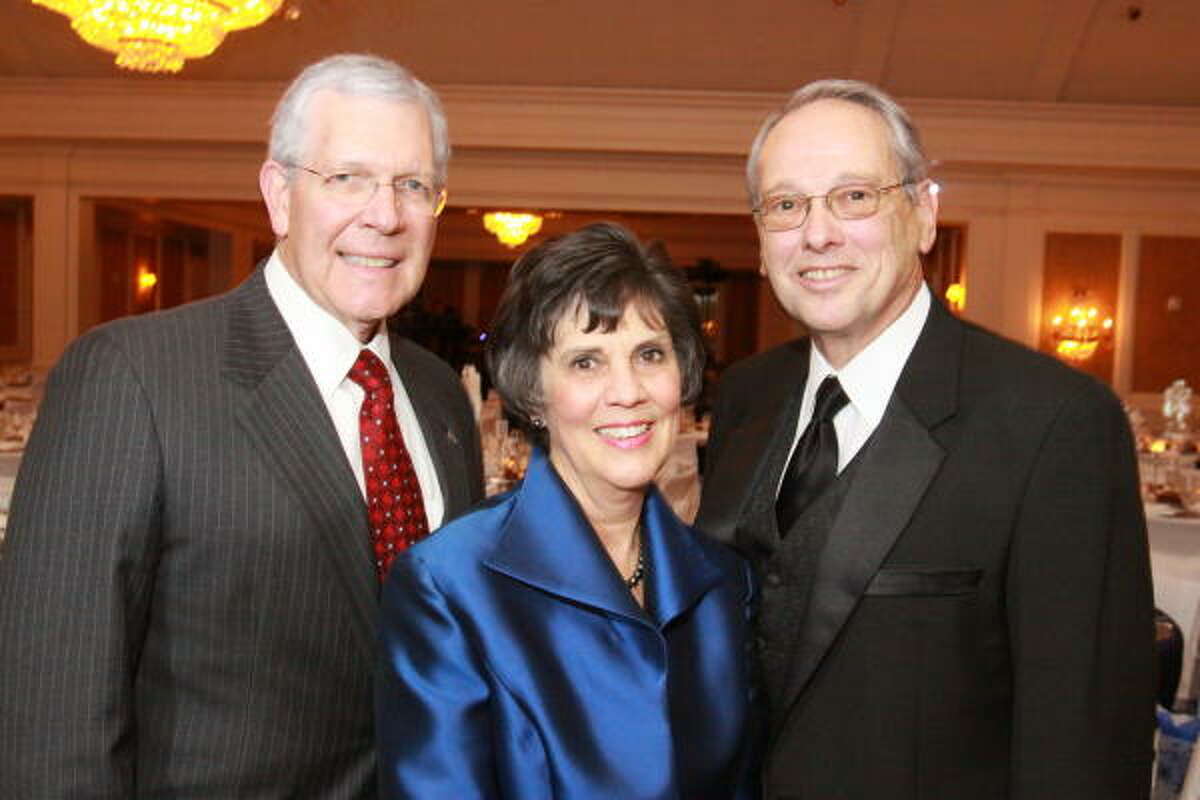 Dr. Charles Millikan, with Judy and Ron Girotto