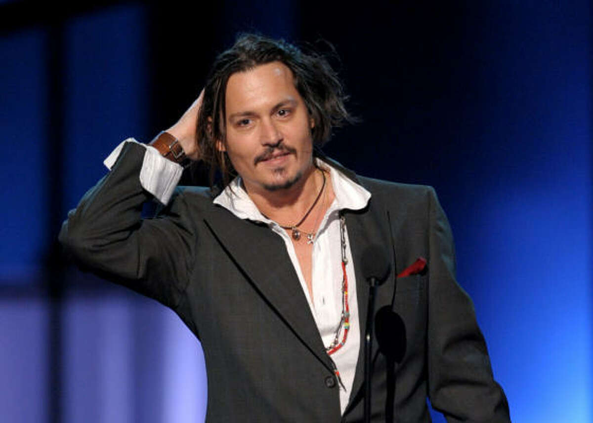 Johnny Depp may have shunned his "sexiest Man Alive" title from People's magazine, but now GQ honors him with the most stylish man. Here's who he beat out.