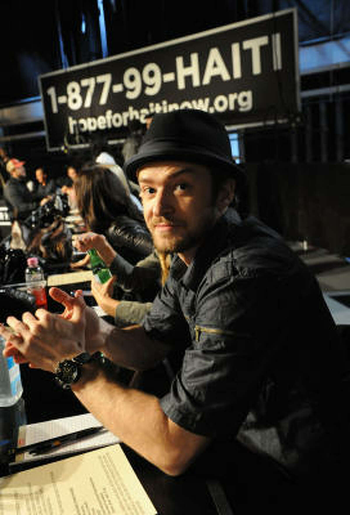 LOS ANGELES, CA - JANUARY 22: In this handout photo provided by MTV, singer Justin Timberlake waits to answer phones during the Hope For Haiti Now: A Global Benefit For Earthquake Relief telethon on January 22, 2010 in Los Angeles, California. (Photo by Jeff Kravitz/MTV Hope for Haiti Now via Getty Images)