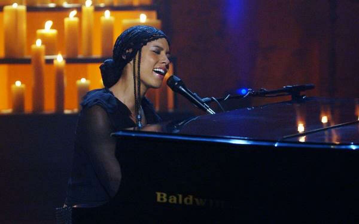 America: A Tribute To Heroes was a telethon event committed to raising money for victims of Sept. 11. George Clooney put together the widely-aired event and included performances by Bruce Springsteen, U2 and Alicia Keys (pictured). Clooney also gathered multiple stars, from Jack Nicholson and Tom Cruise to Julia Roberts, to handle the phones — and speak directly to donors.