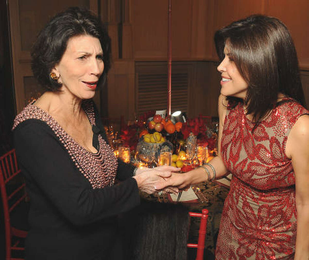 Pamela Fiori and Ericka Bagwell at a UNICEF fundraiser at the home of Becca Cason Thrash.