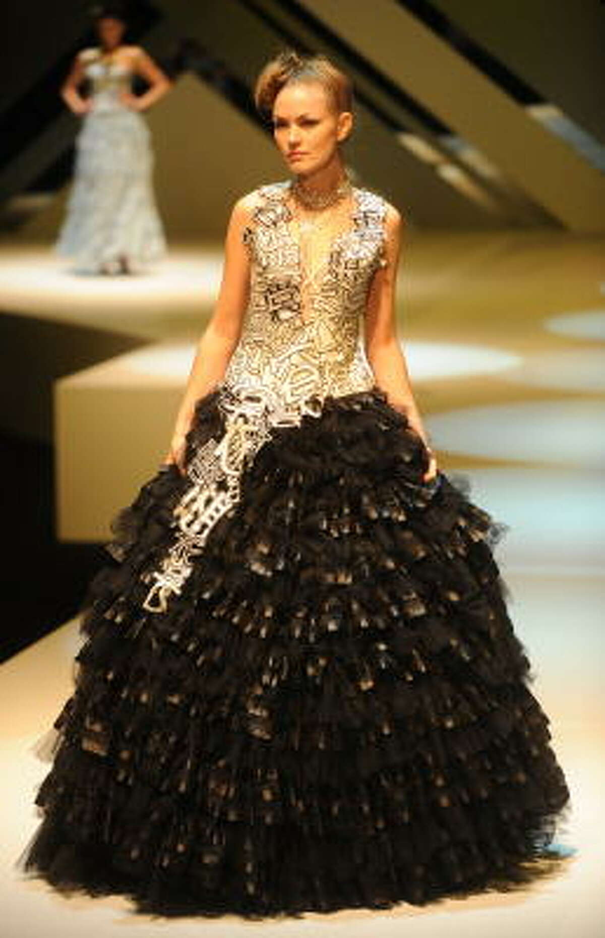 A model wears a creation by Goji Lin during Hong Kong Fashion Week.