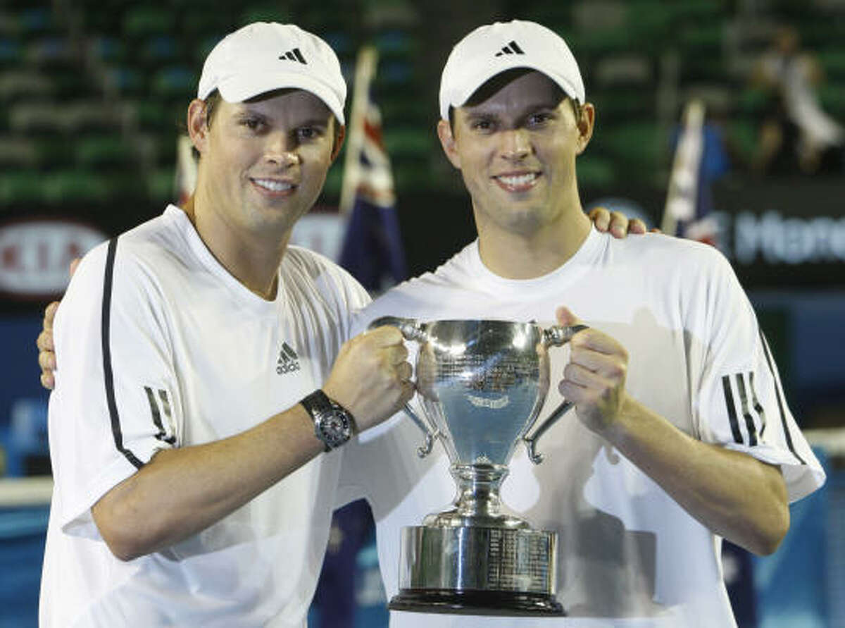 Bob Bryan, left, and Mike Bryan regained their No. 1 ranking and won a seventh Grand Slam.