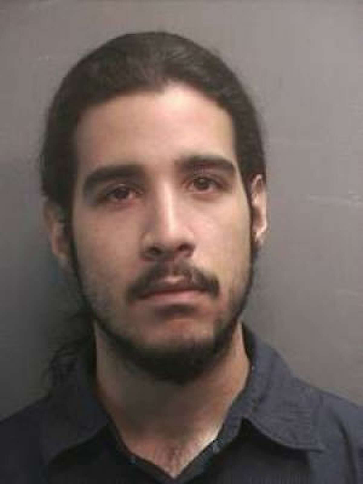 Authorities say Bryant Gerley Munoz was caught photographing up a woman's skirt.