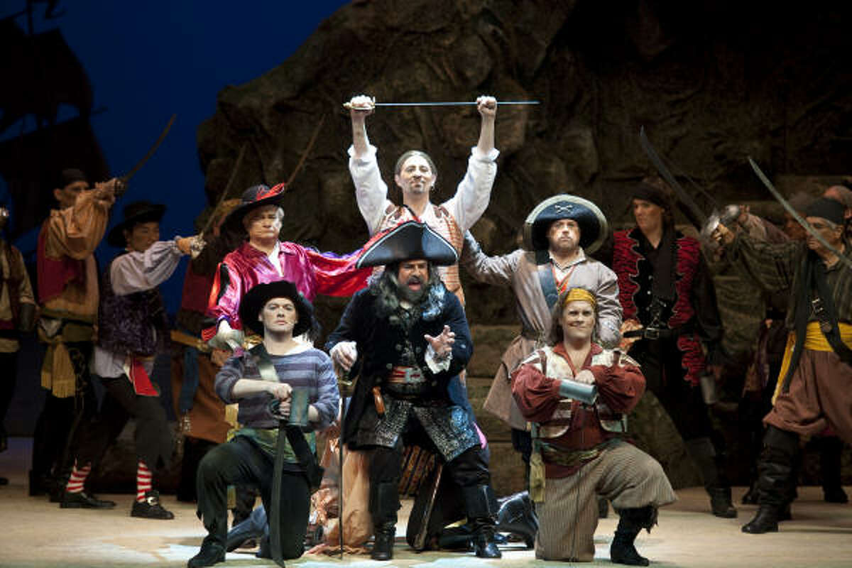 Pirate King, played by Ralph Katz, leads his mates in The Pirates of Penzance at the Wortham Center. The Gilbert and Sullivan Society of Houston produced the show.