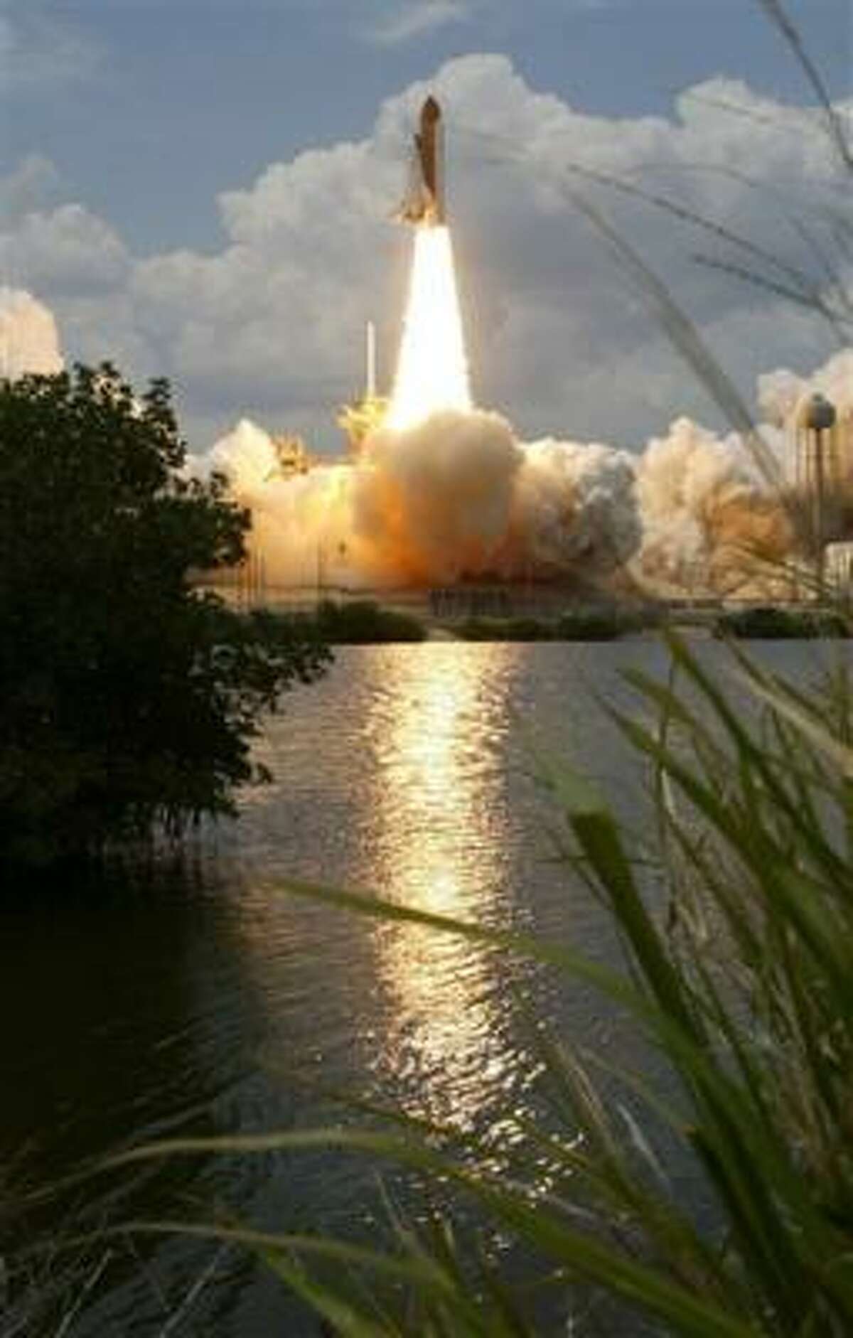 Space shuttle Atlantis lifts off from Kennedy Space Center on Monday.