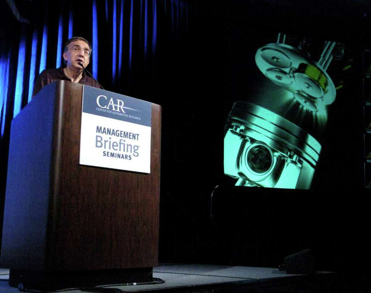 Chrysler Group LLC's CEO Sergio Marchionne speaks to a morning session at the annual Center for Automotive Research's Management Briefing Seminar Wednesday, Aug. 3, 2011, at the Grand Traverse Resort and Spa near Traverse City, Mich. Marchionne, also head of Italy?s Fiat SpA, said changes to the internal combustion engine, and not electric or hydrogen fuel cell technology, will be the answer to meeting the standards. (AP Photo/John L. Russell)