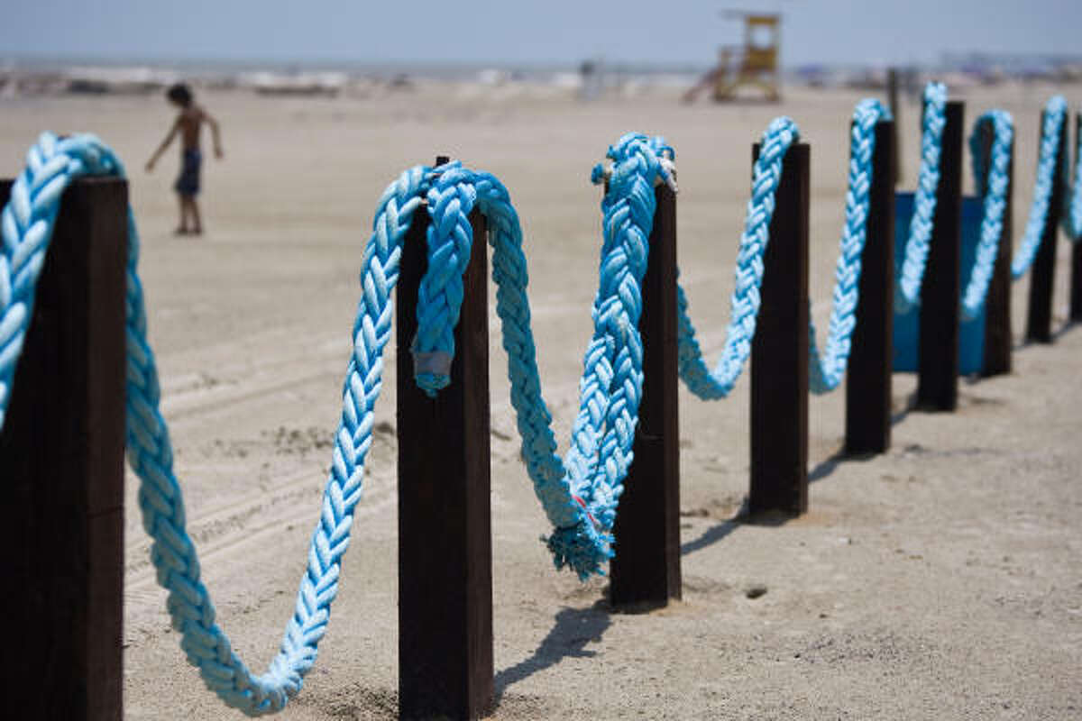 Blue water temporarily invades Galveston Island beaches