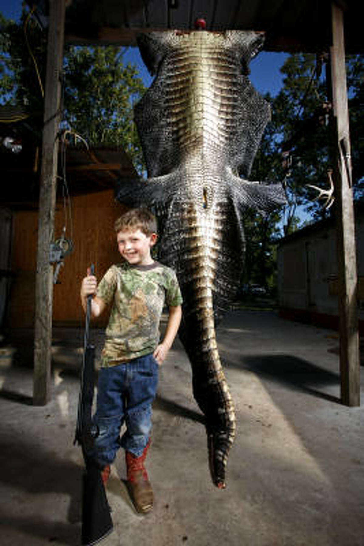 At age 5, Simon Hughes is no stranger to hunting. His first big trophy — a 12-foot-6, 800-pound alligator, may be hard to top, though.