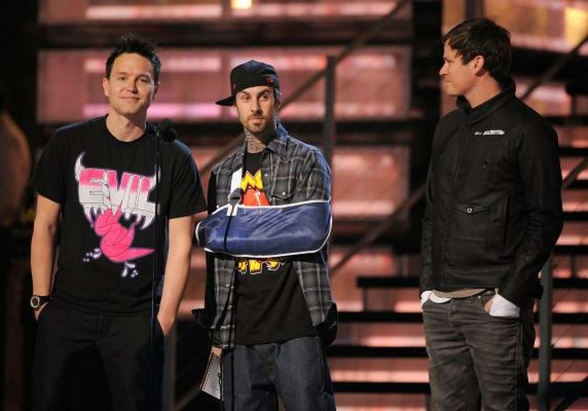 Mark Hoppus, from left, Travis Barker and Tom DeLonge broke the news of a blink-182 reunion during the 51st annual Grammy Awards in February. It was the first time the three appeared onstage since 2004.