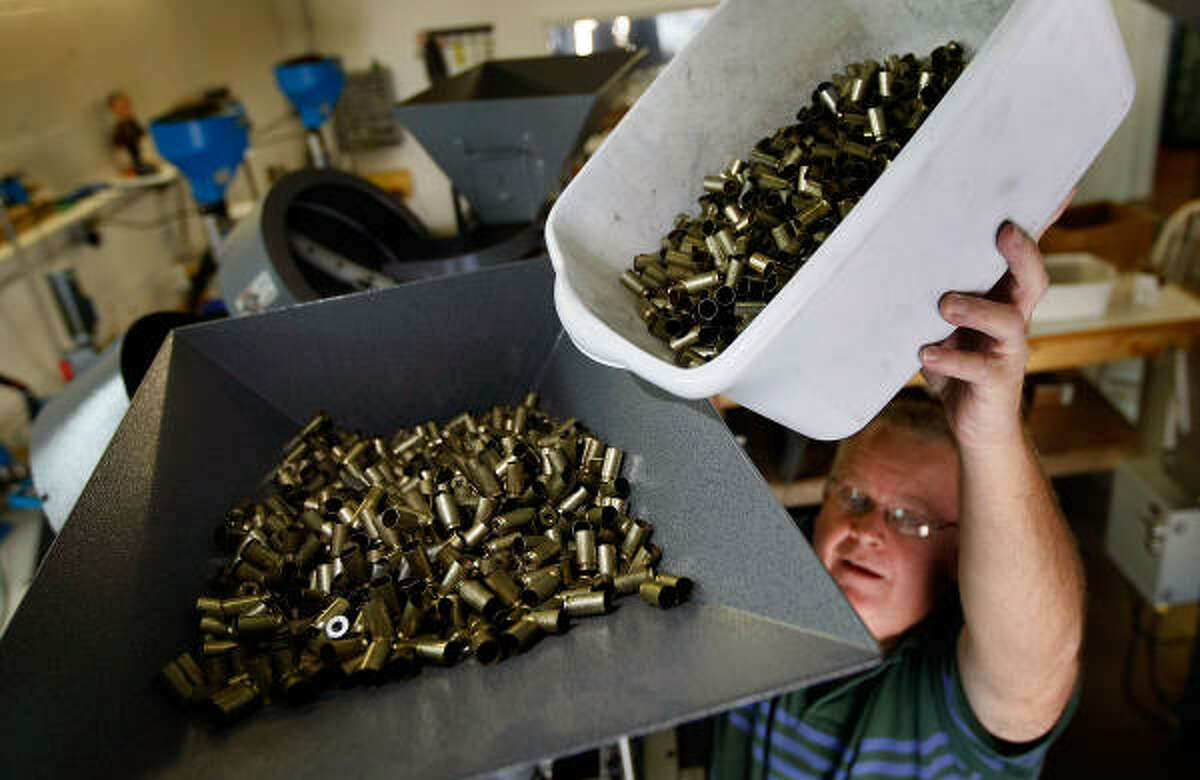 Ammunition is loaded last month at a factory in Miami. U.S. companies report that demand for ammo has gone up.