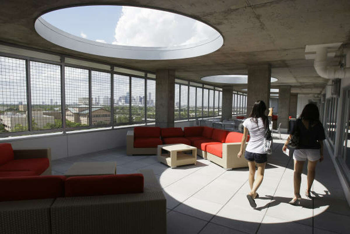 Yann-Bor Wen, left, and her roommate, Lina Xia, check out the terrace at Calhoun Lofts, the University of Houston's new residential hall.