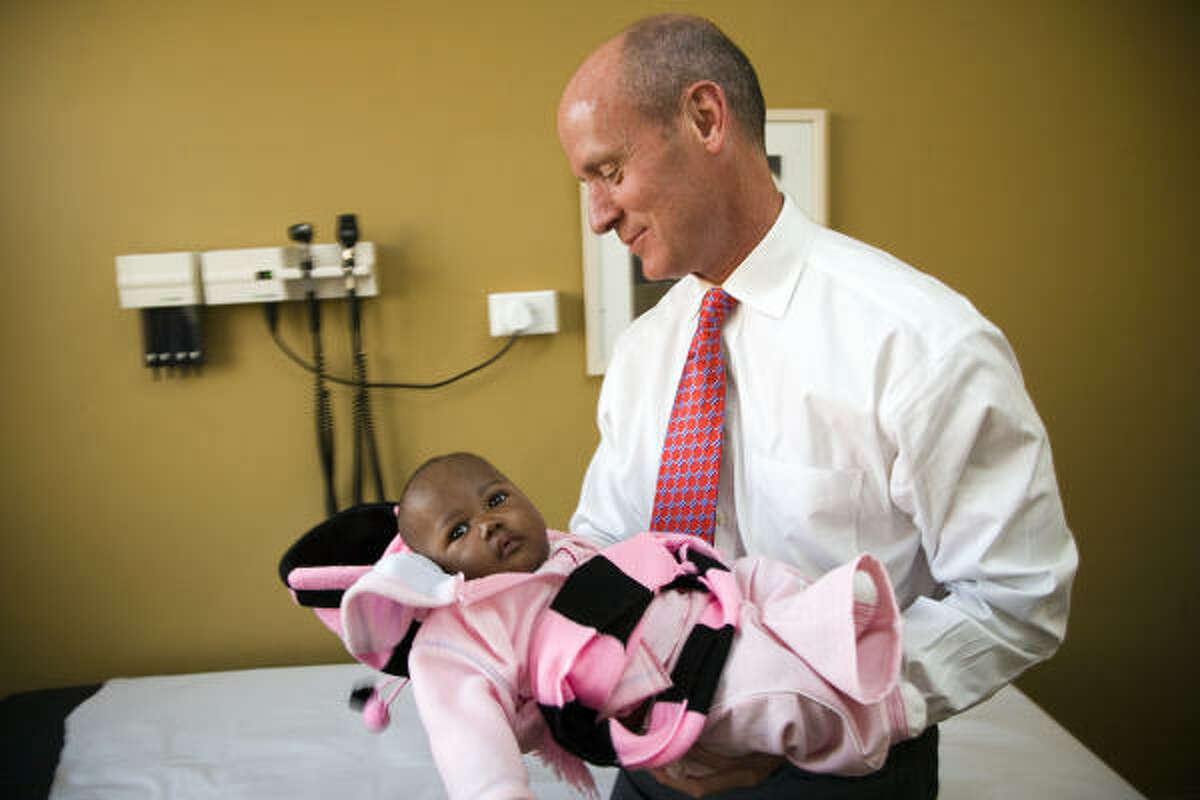 Dr. Mark Kline plans to remain involved with an international AIDS effort while tending to his new duties in Houston.