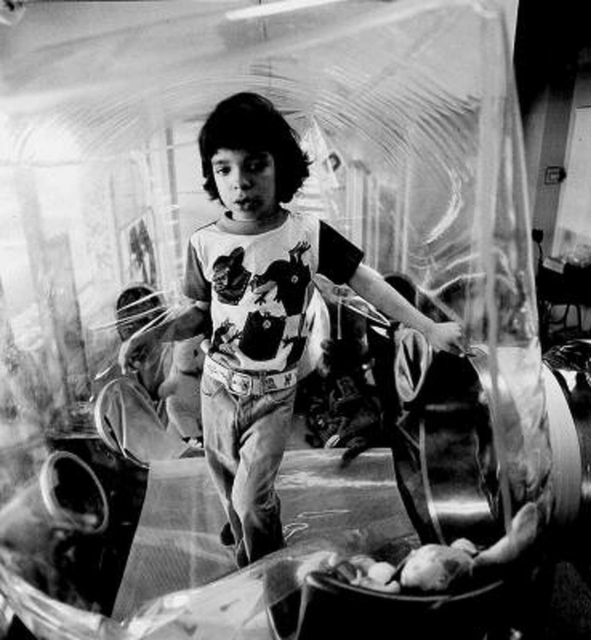 David Vetter, in his bubble at the age of 5, had a rare condition that left his body defenseless against infections.