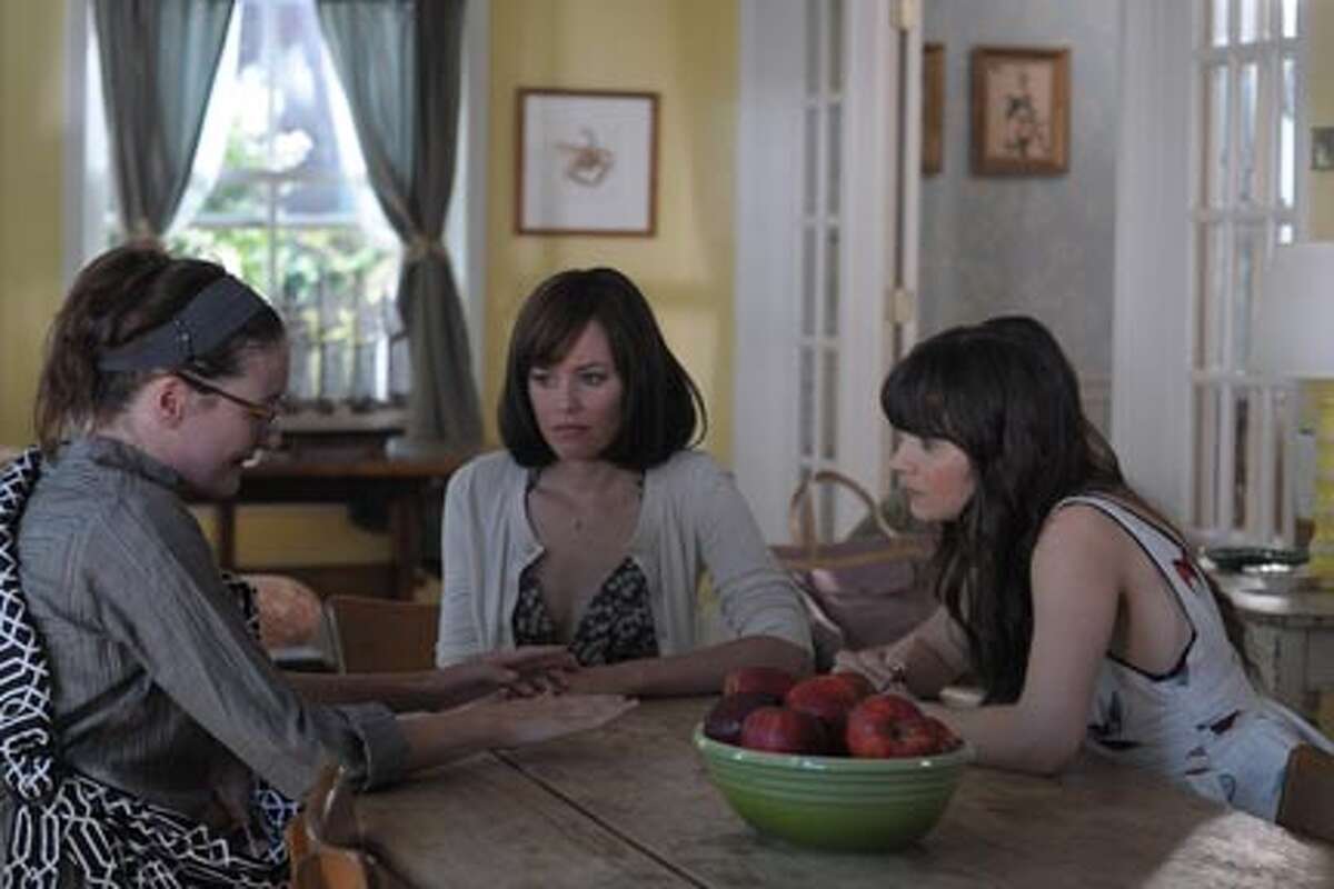 (L-R) Emily Mortimer as Liz, Elizabeth Banks as Miranda and Zooey Deschanel as Natalie in "Our Idiot Brother."