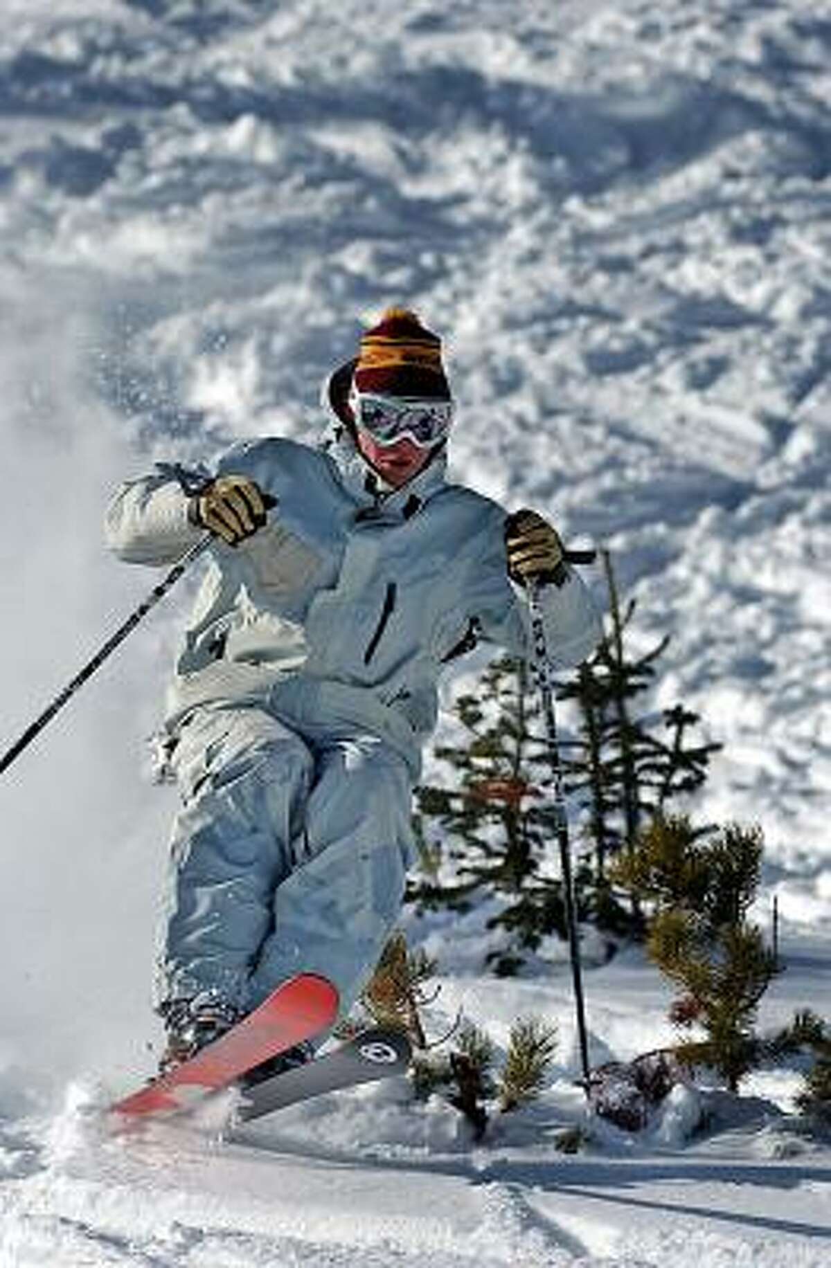 DOWNHILL: A skier plows through powder snow at Vail Mountain Resort.