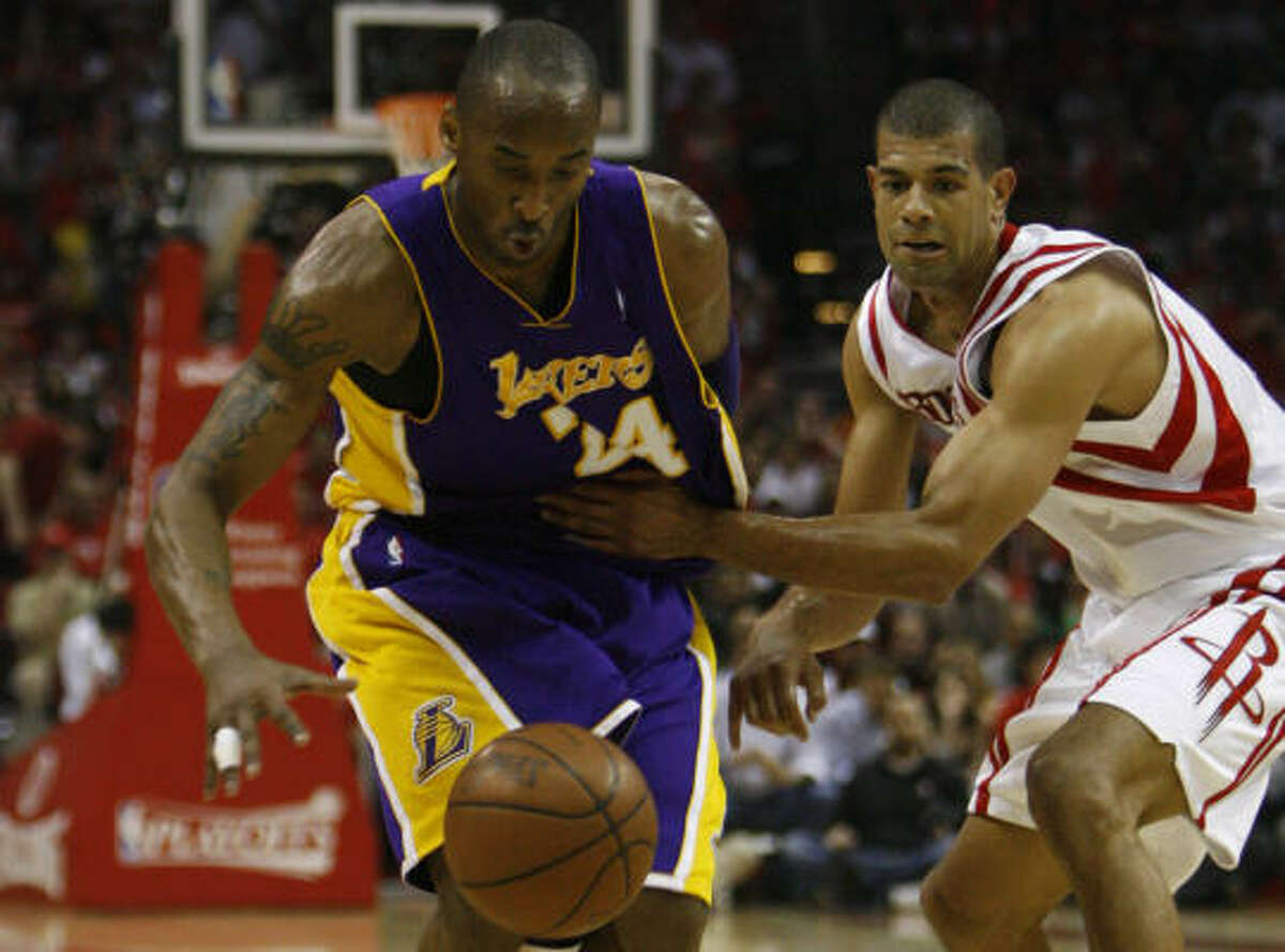 Shane Battier, right, tries to slow down Lakers guard Kobe Bryant, who had another big night in the series.