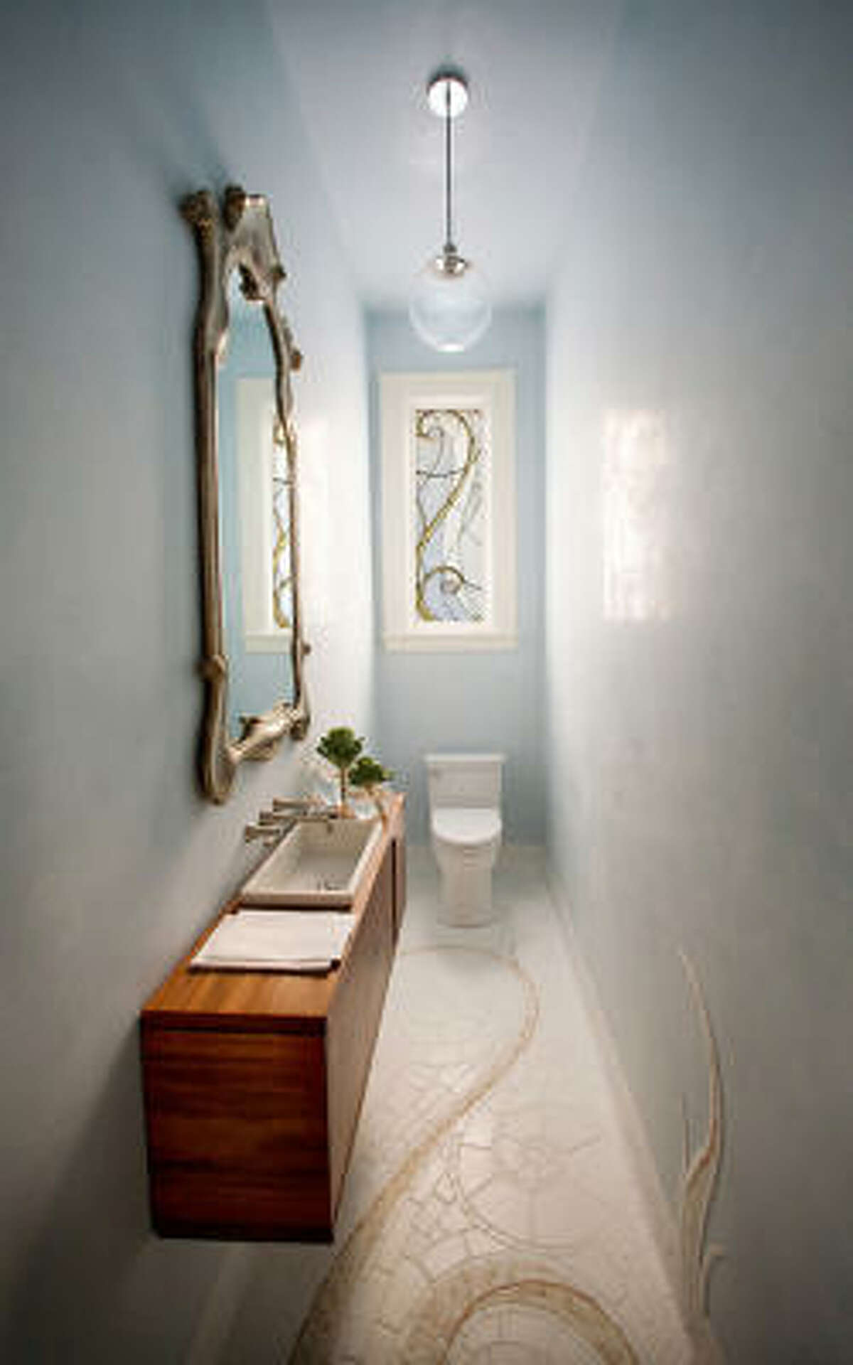 Designer's narrow focus makes most of odd-shaped room
