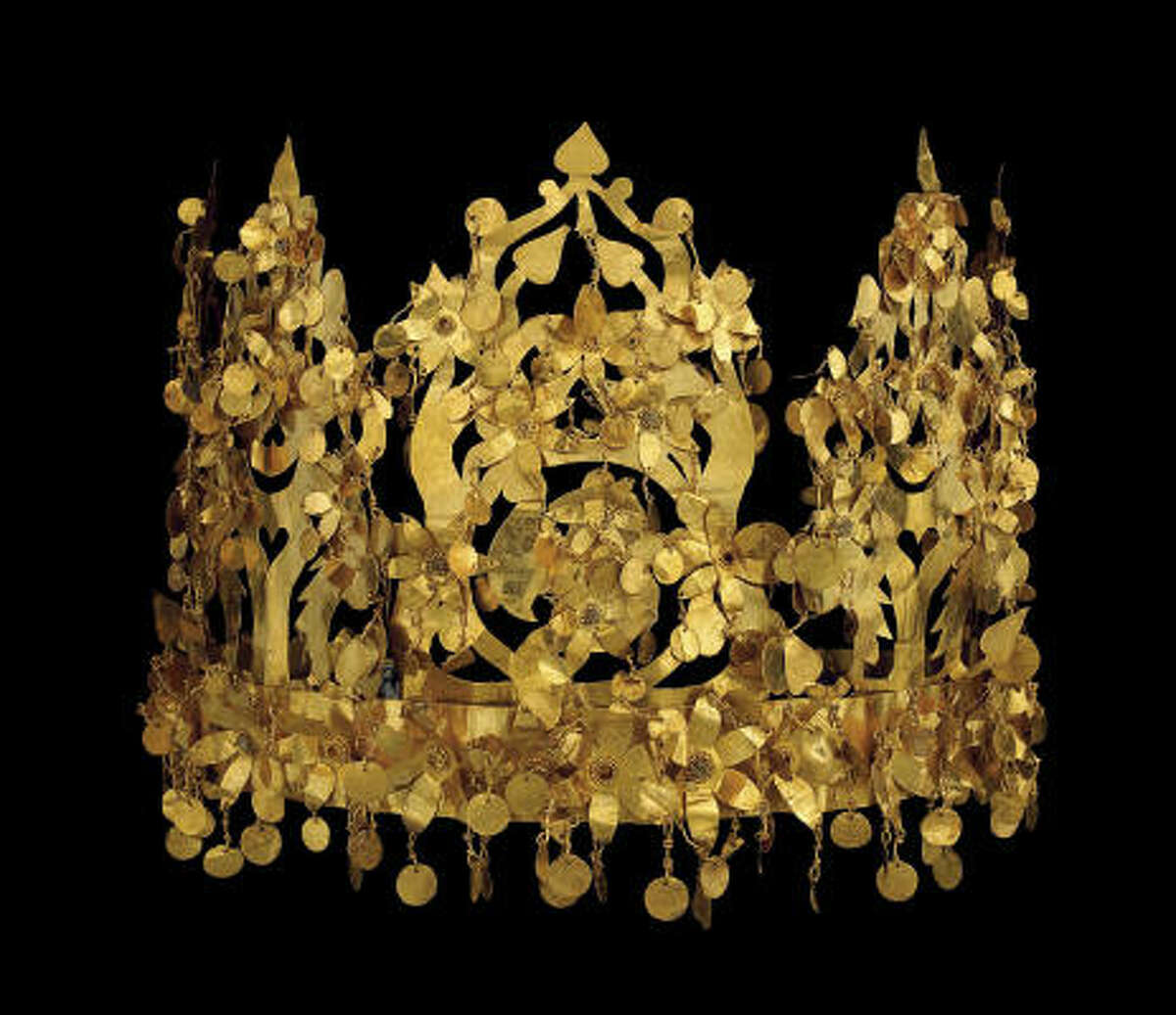 Gold objects, such as this crown, were hidden for safekeeping until now.