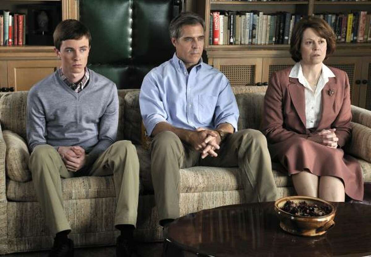 Determined to “cure” her son of homosexuality, Mary Griffith (Sigourney Weaver), right, brings Bobby (Ryan Kelley), left, and her husband, Bob (Henry Czerny), to therapy sessions in the Lifetime movie Prayers for Bobby.