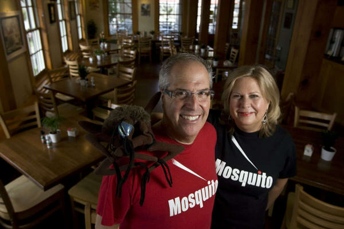 Stephen and Patricia Rennick, owners of Mosquito Cafe in Galveston, hope their business benefits from growth at UTMB. ﻿