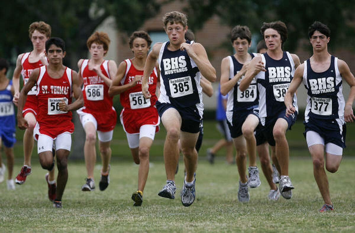 RICE INVITATIONAL: St. Thomas and Briarwood School runners jump off the starting line for the boys race at the Rice Invitational Cross Country Meet held at the Rice University campus on September 19.