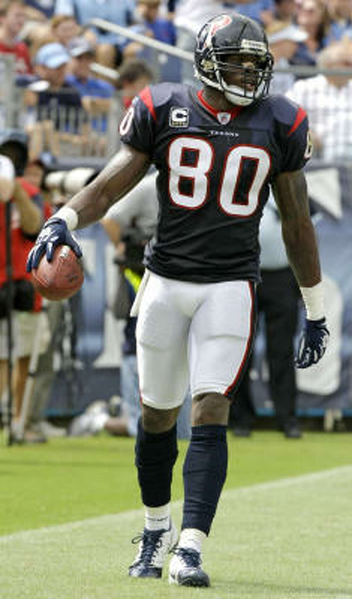 Houston Texans wide receiver Andre Johnson (80) walks through the end zone after scoring a touchdown against the Tennessee Titans during the first quarter of an NFL football game at LP Field Sunday, Sept. 20, 2009, in Nashville. ( Brett Coomer / Chronicle )