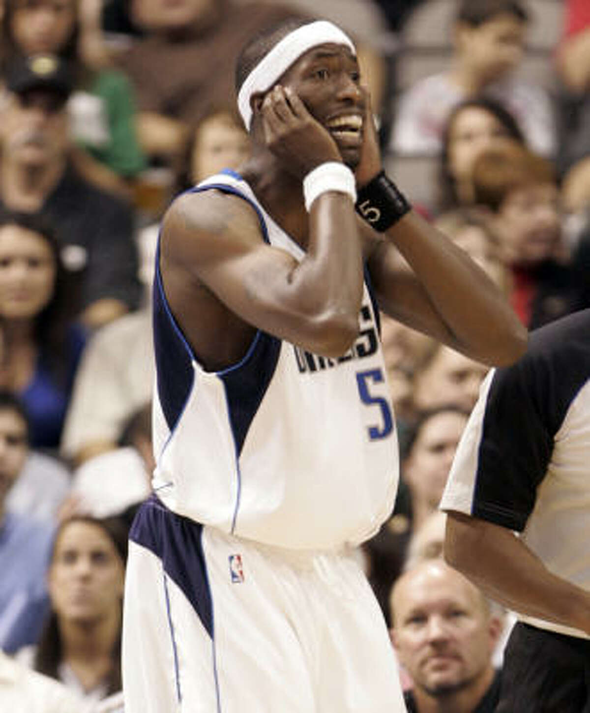 Mavericks forward Josh Howard is surprised by an offensive foul call in the first quarter.