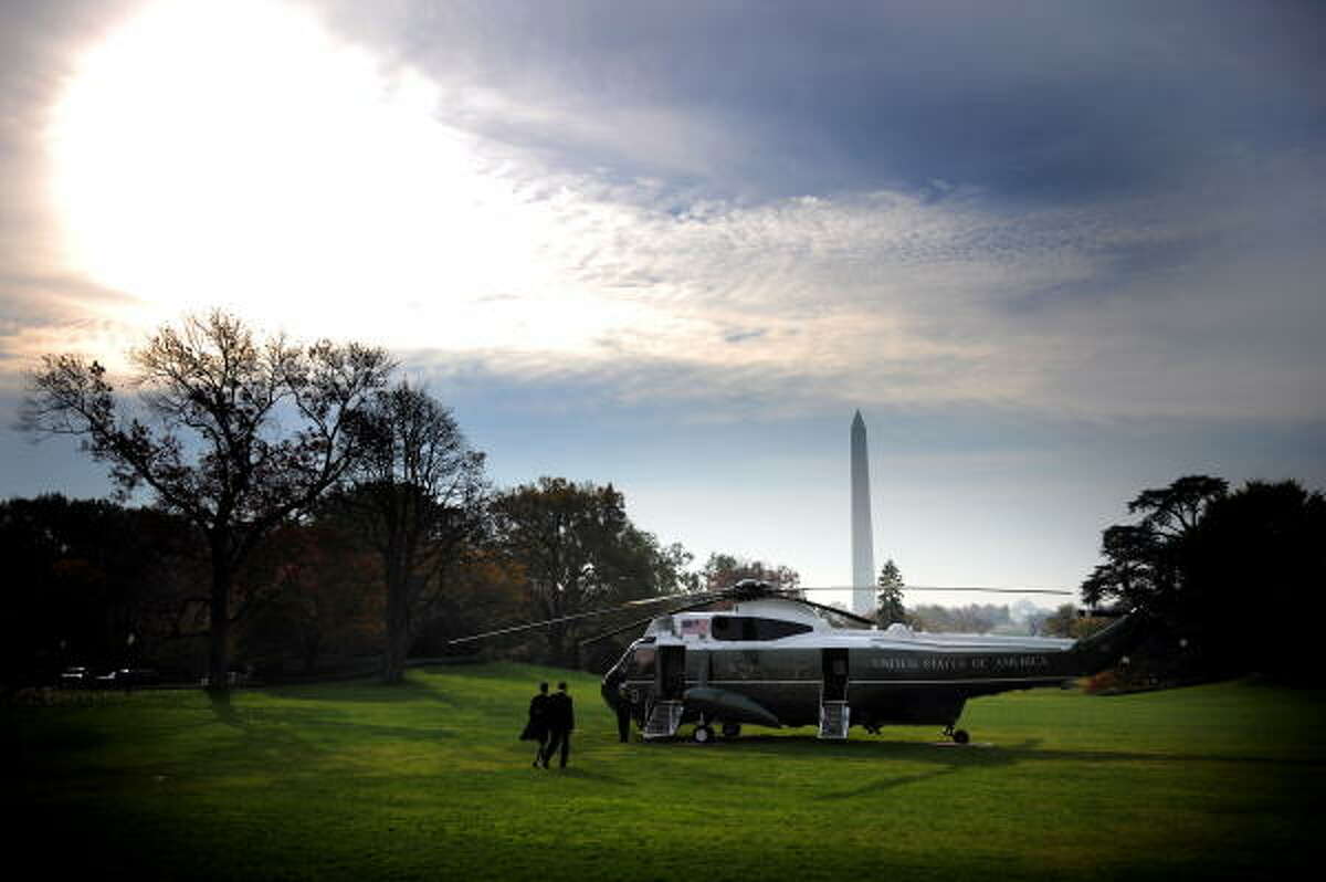 President Barack Obama and First Lady Michelle Obama prepare to board Marine One on the South Lawn of the White House.