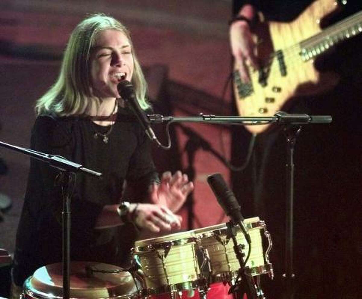 Taylor Hanson of 'Hanson' plays the bongo drums on stage at the 40th annual Grammy Awards in 1998 at New York's Radio City Music Hall.