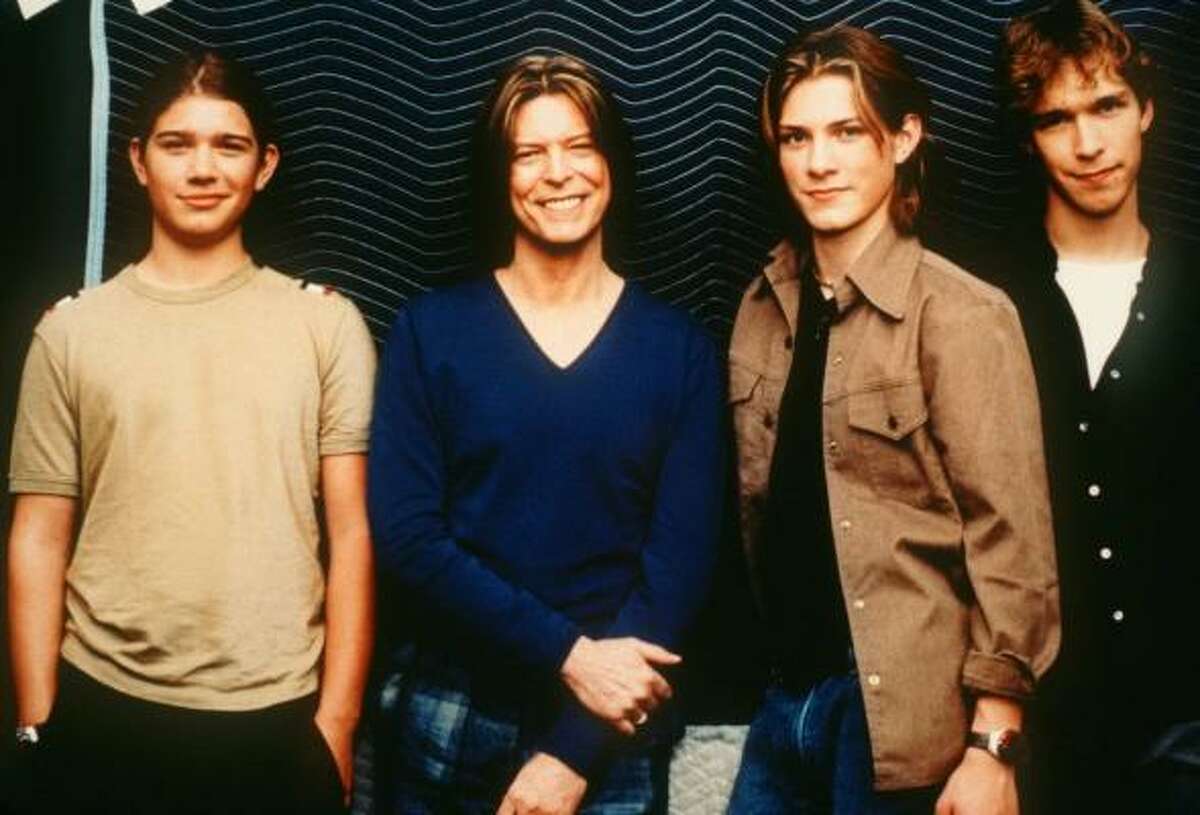 Singers Zac Hanson, David Bowie, Taylor Hanson and Isaac Hanson, from left, in 2000.